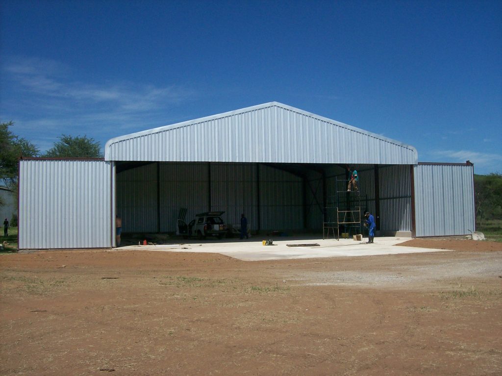 Airplane hangar with open doors