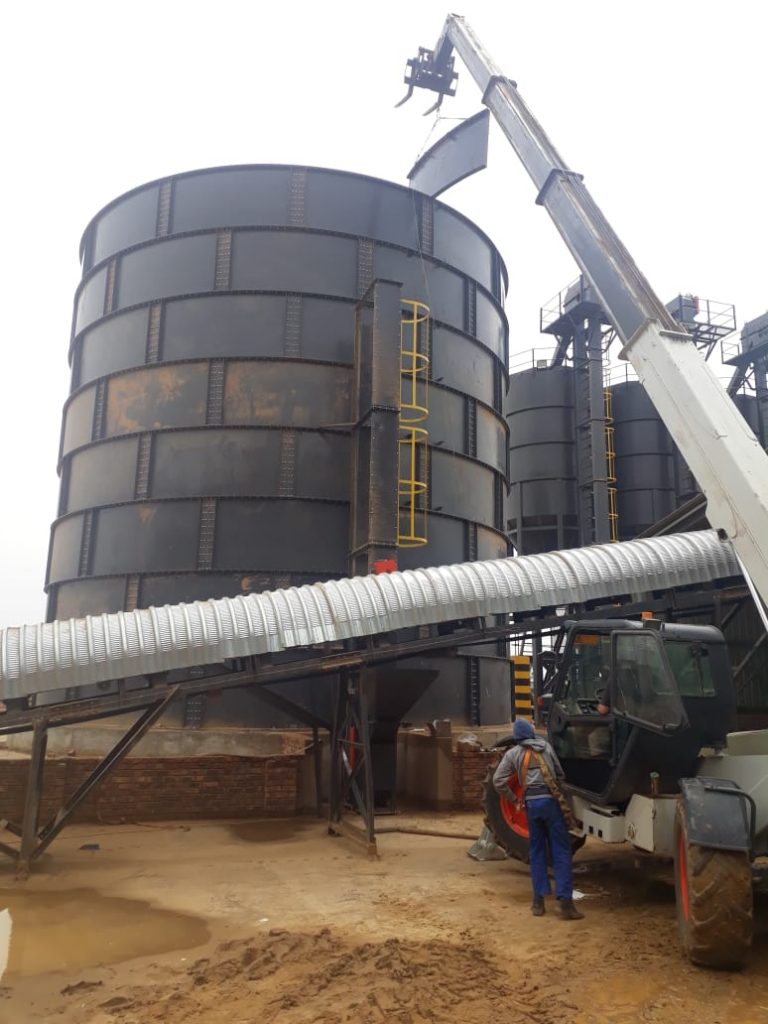 Erecting a silo with telehandler